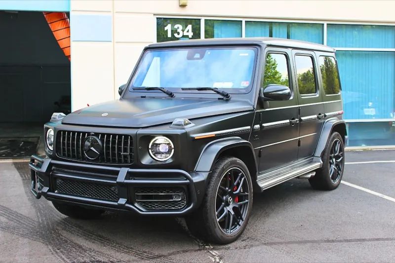 Matte black Mercedes-Benz G-Class with stealth PPF outside the shop