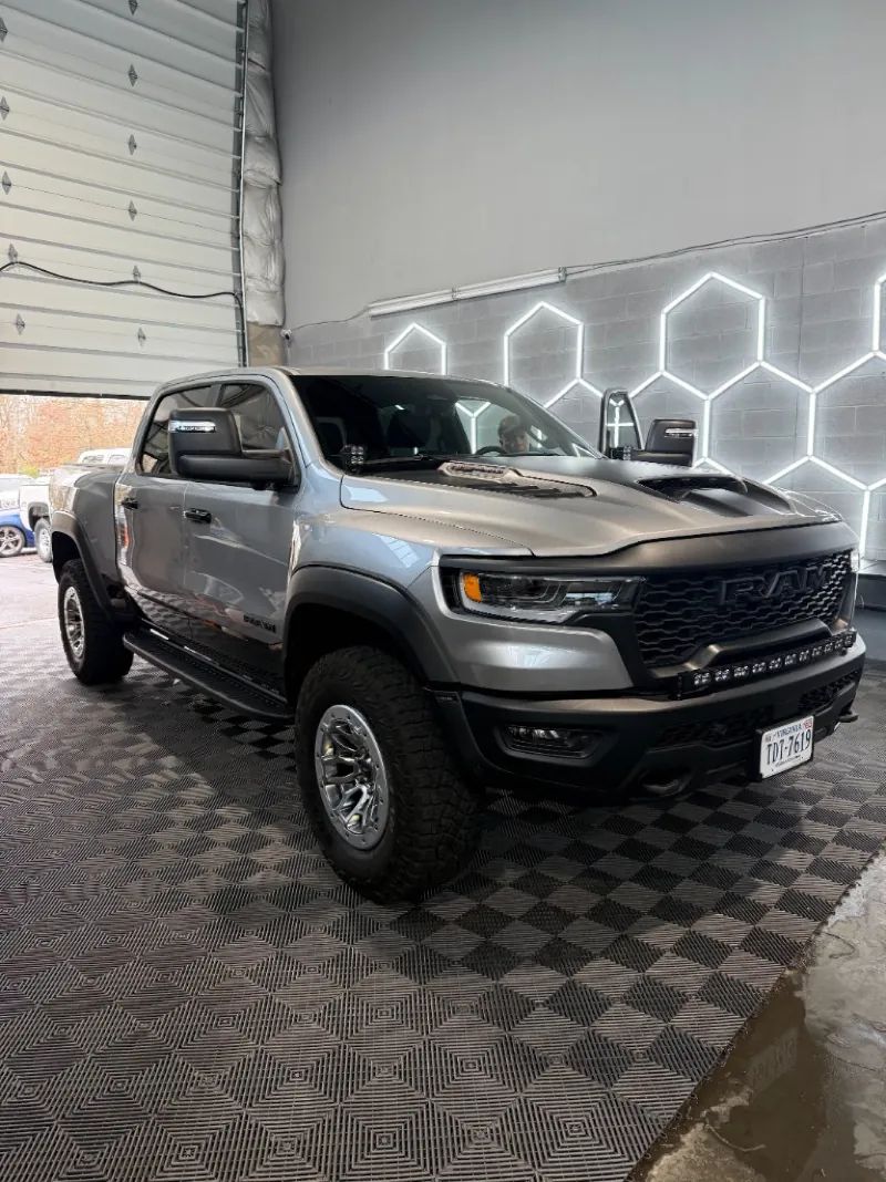 Silver RAM TRX with ceramic coating finish under honeycomb shop lighting