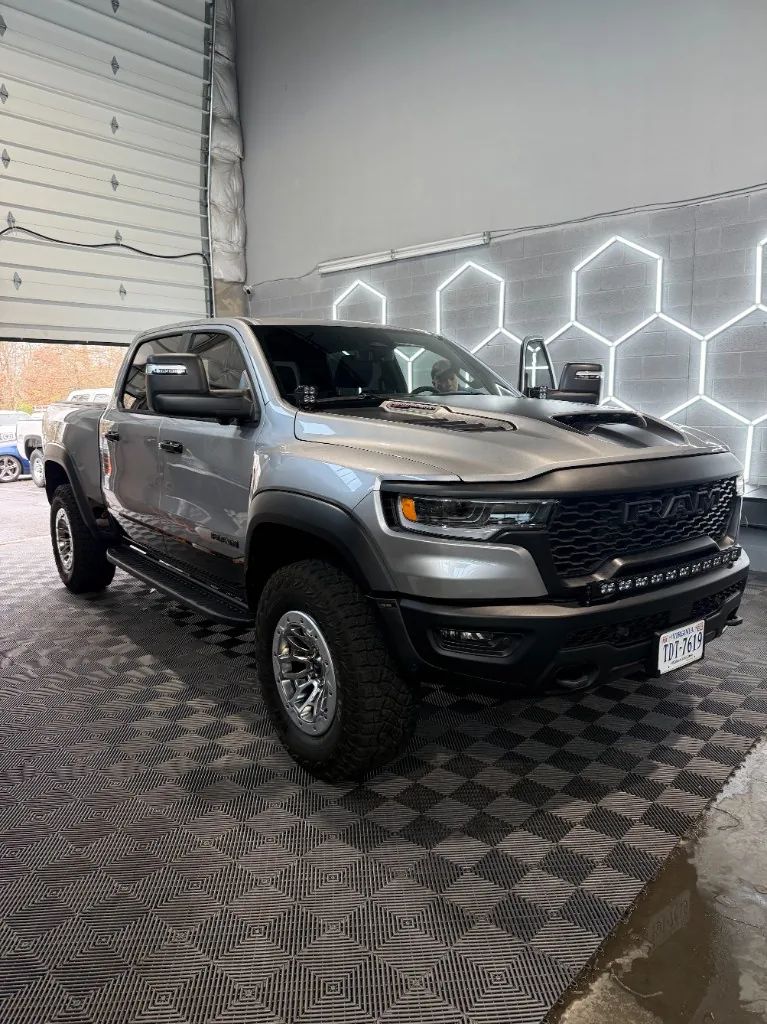 Silver RAM TRX with ceramic coating finish under honeycomb shop lighting