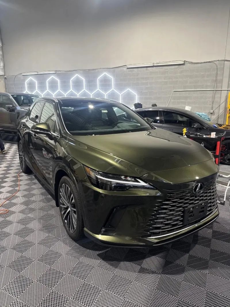 Glossy green Lexus SUV after work at Deluxe Paint Protection in Chantilly