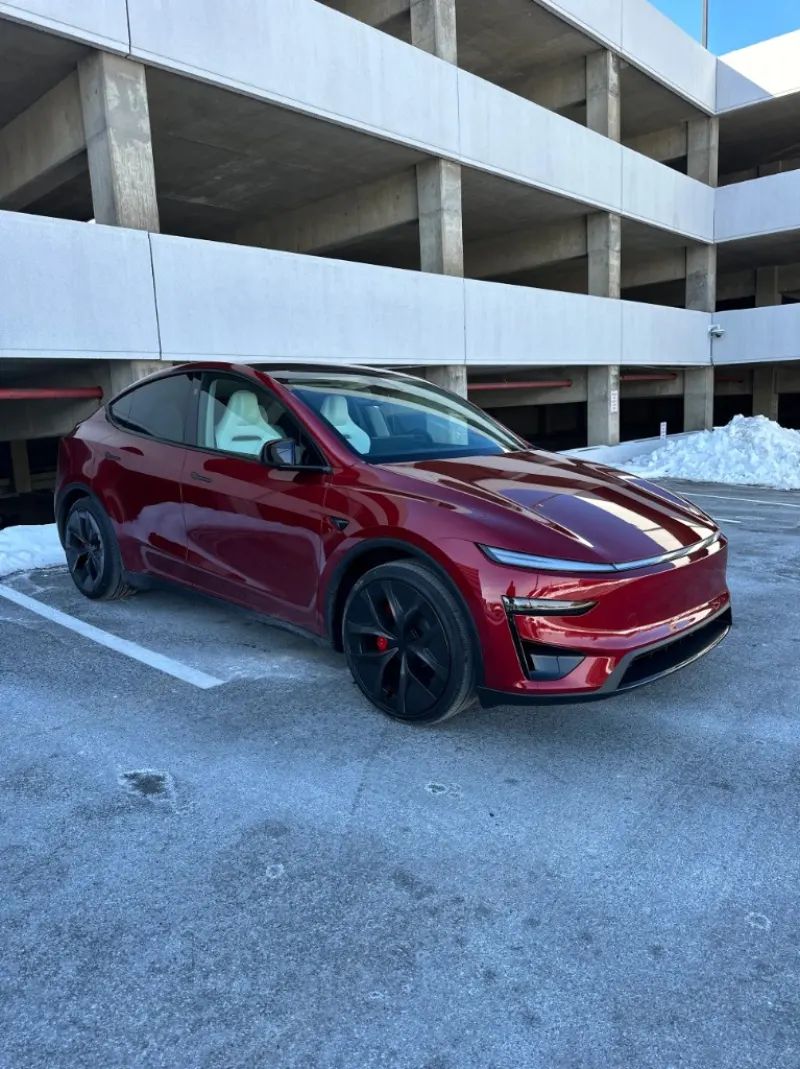 Red Tesla Model 3 with ceramic coating and PPF finish